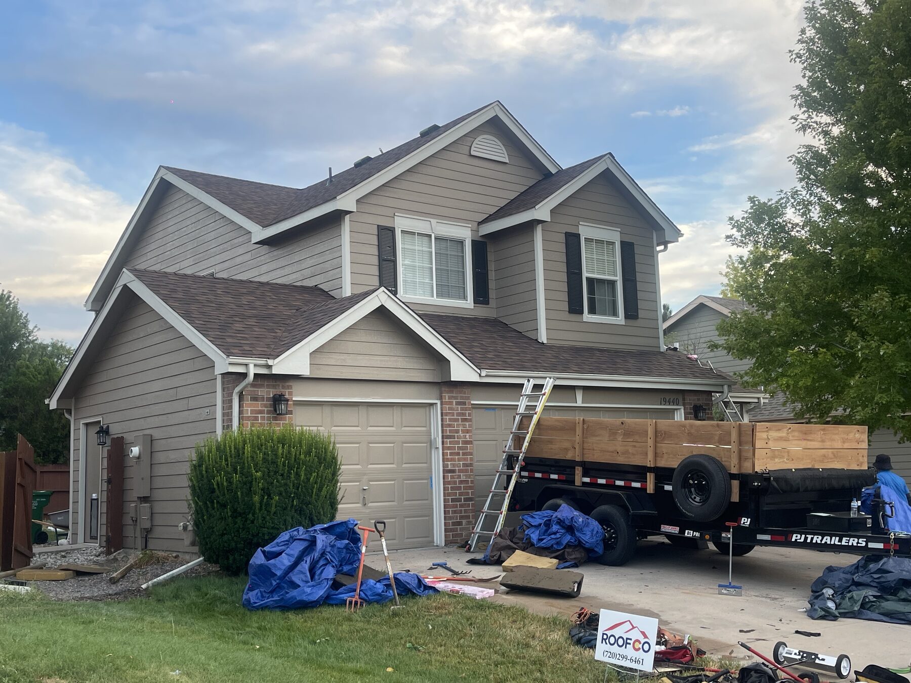 Hail-damage roof tear-off by Roofco crew, Denver Metro