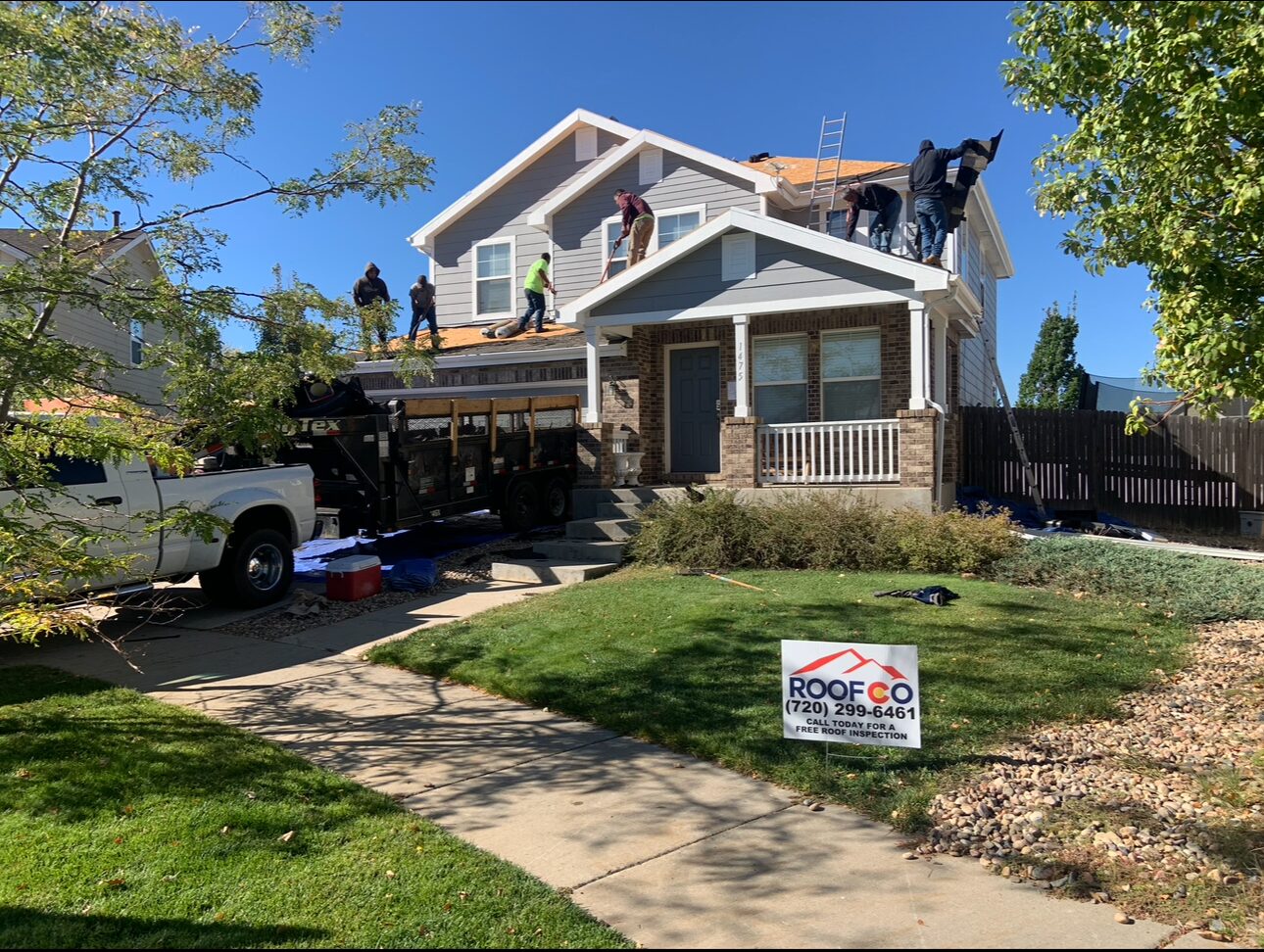Roofco crew installing a roof in Denver Metro
