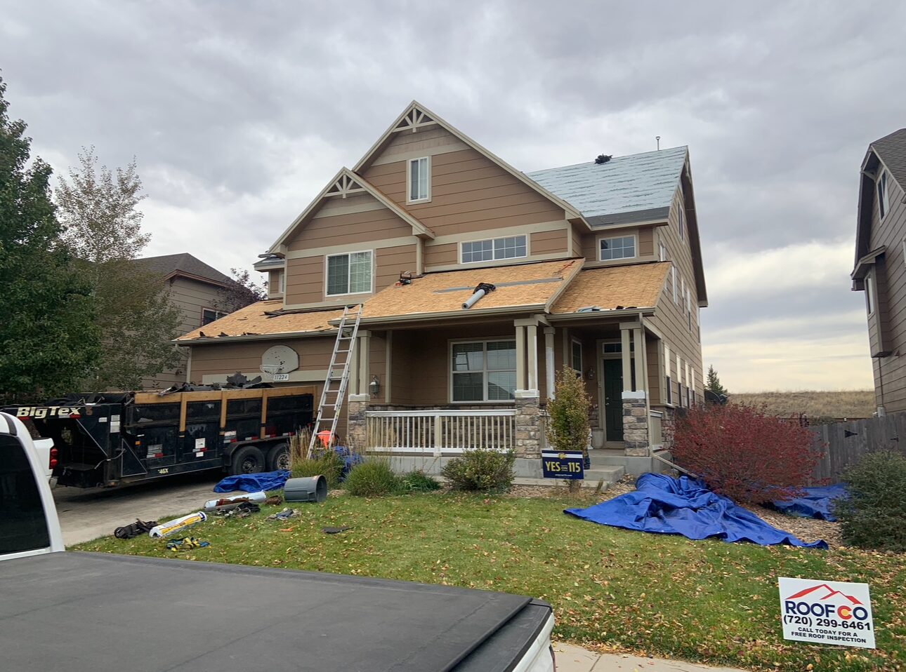 Roofco crew at work on a Denver-area home