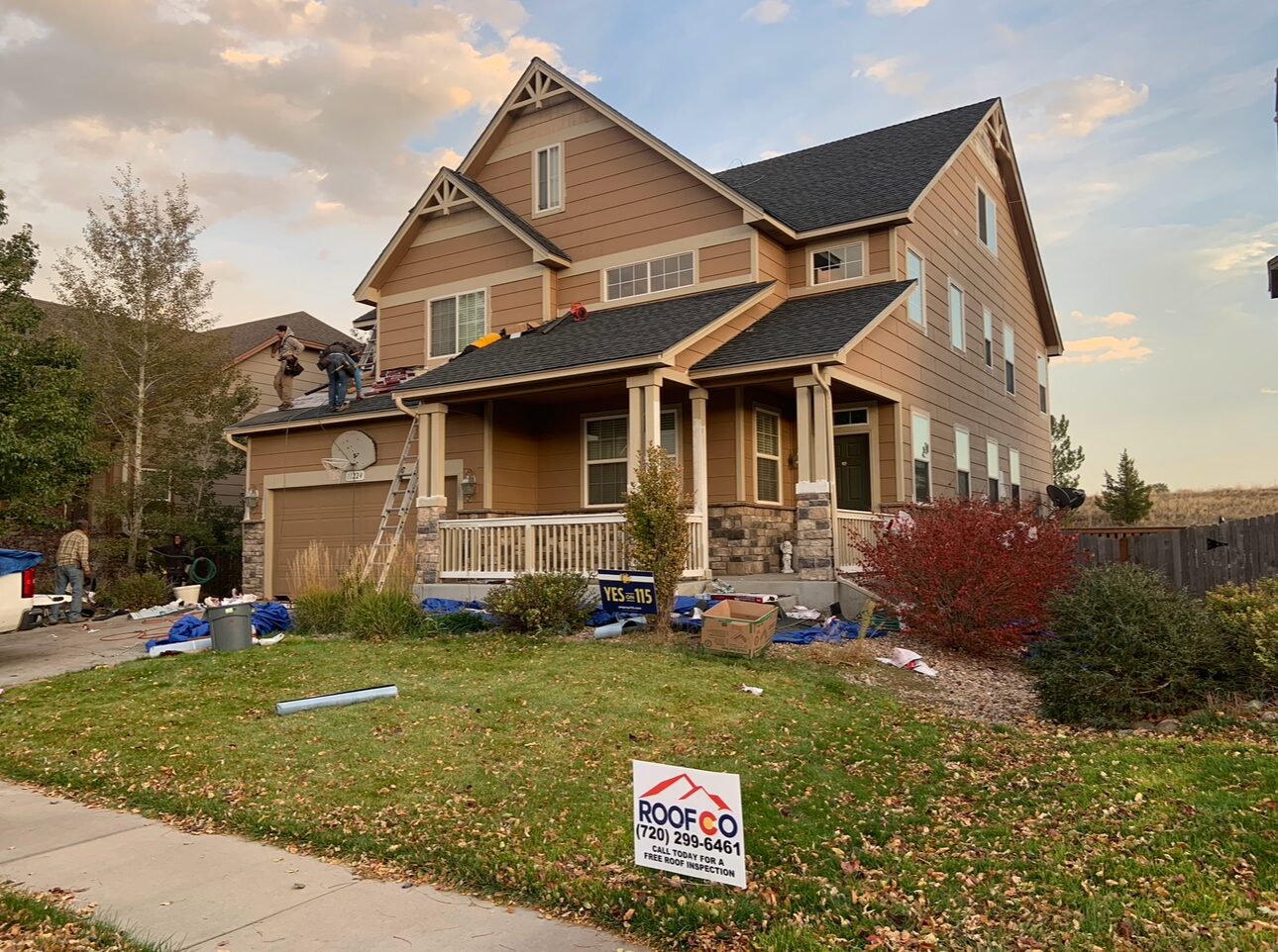 Roofco project with yard sign in Denver suburbs